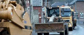 Heavy equipment in the construction parade - In the Beginning 